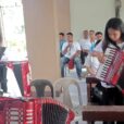Youth in PHILIPPINES learning music through accordion donation