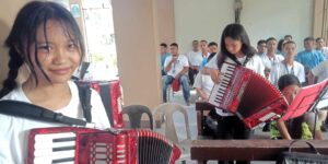 Youth in PHILIPPINES learning music through accordion donation