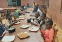Youth attending Foyer Don Bosco, located in Porto-Novo, Benin, received a shipment of nutritious meals through a partnership between Salesian Missions