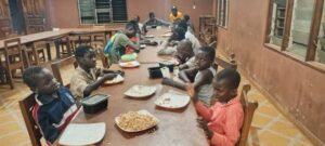 Youth attending Foyer Don Bosco, located in Porto-Novo, Benin, received a shipment of nutritious meals through a partnership between Salesian Missions
